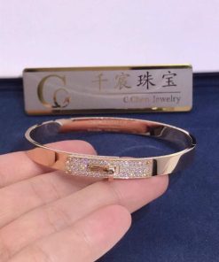 Herm??s Kelly Bracelet in rose gold set with diamonds H110014B